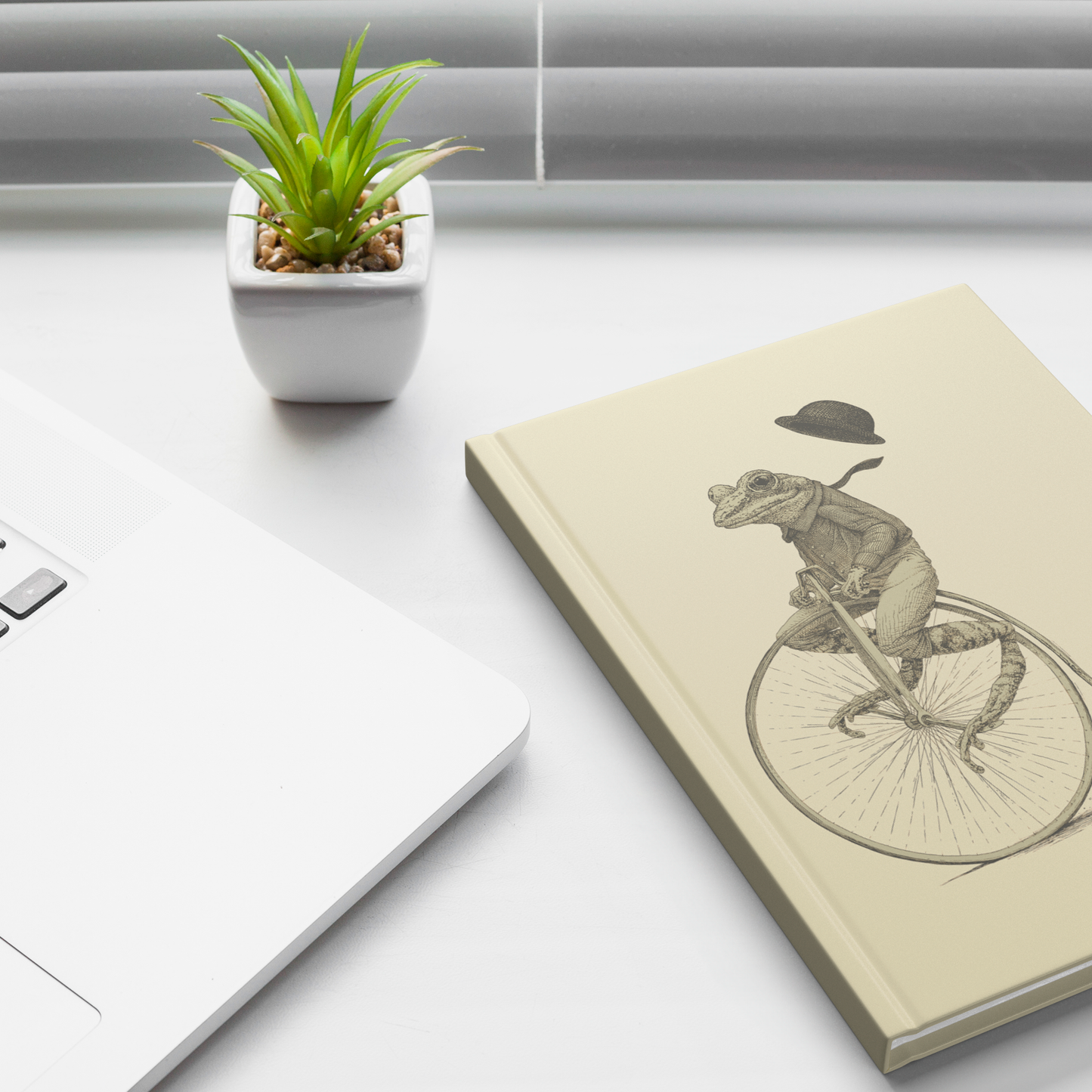 Penny_Farthing_Frog_Hard_Bound_Journal_Lifestyle_1_Mockup.png